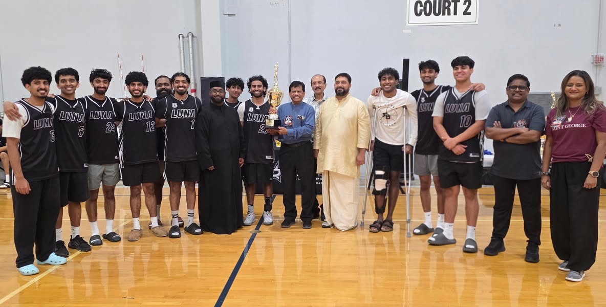 Players in matching jerseys gather for a tournament award presentation